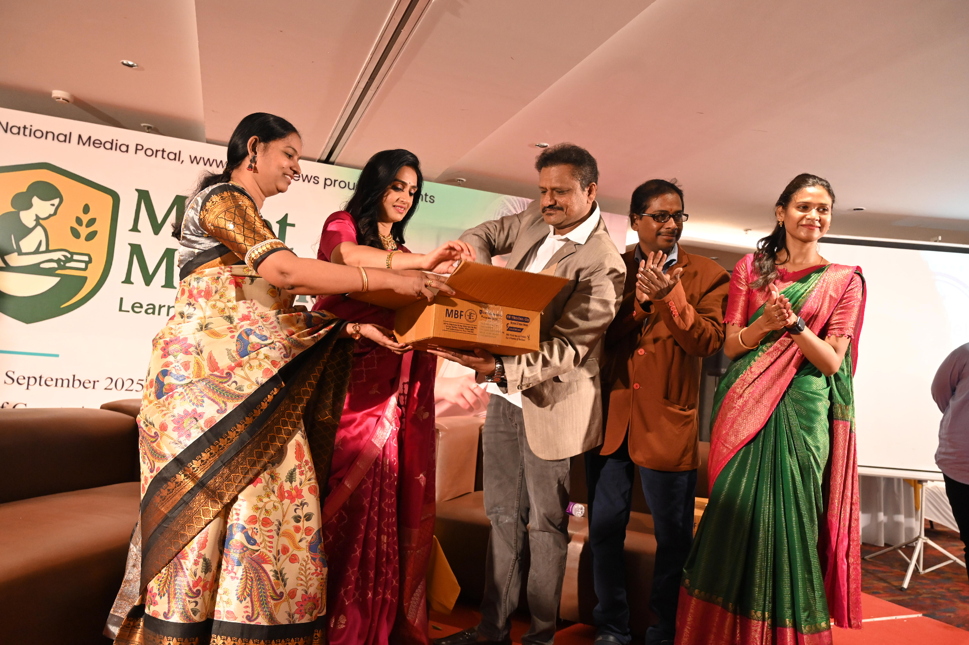 Millet Mothers product hamper handover